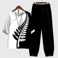 Zwarte broek met witte bedrukte top als tweedelige set