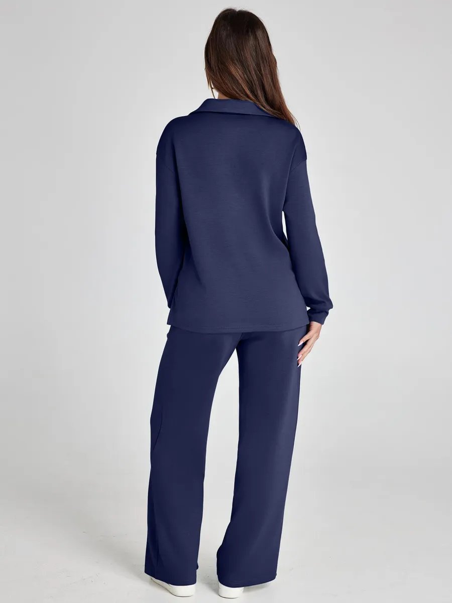 Achterkant van de tweedelige dames set met wijde broek in marineblauw