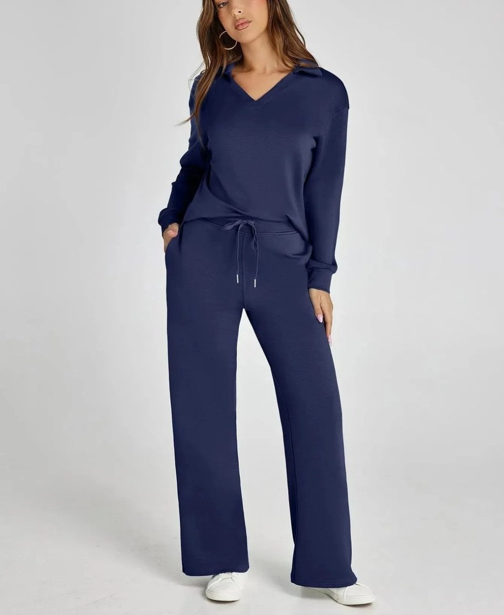 Tweedelige dames set met polokraag en wijde broek in marineblauw, voorkant