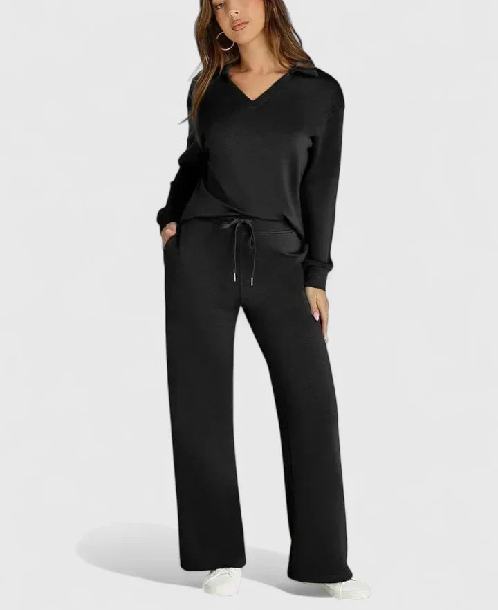 Tweedelige dames set met polokraag en wijde broek in zwart, voorkant