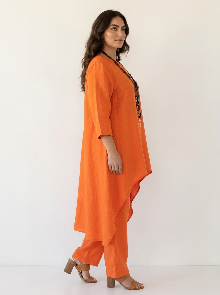 Oranje tuniekset met broek van opzij