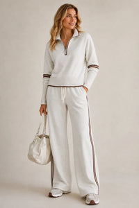 Witte sweaterset dames met kwartrits en wijde broek met contrastbies