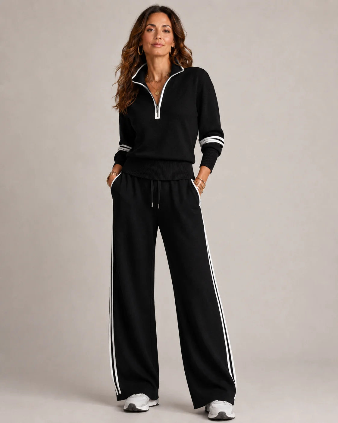 Zwarte sweaterset dames met kwartrits en wijde pijpen