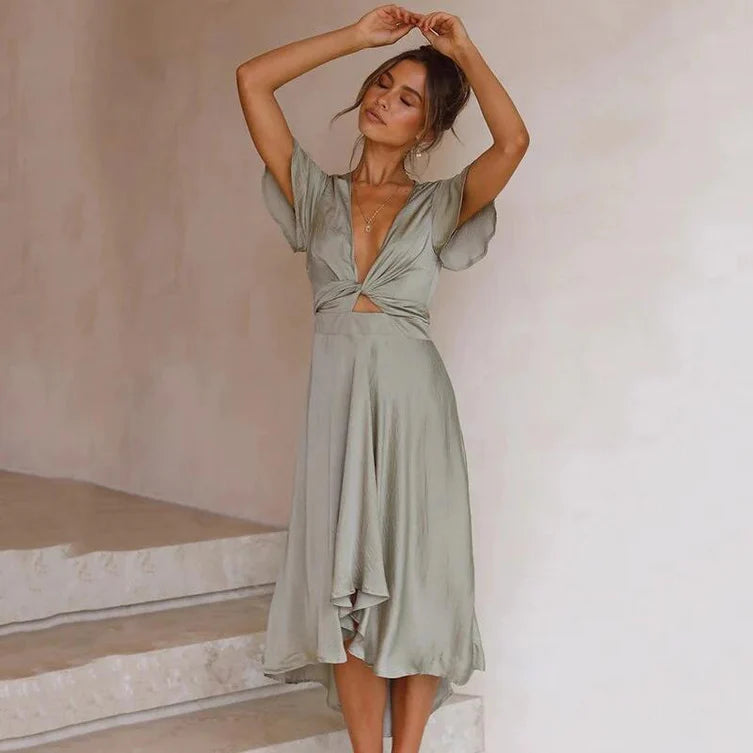 Dames Jurk met Strikdetails en V-Hals – Elegant & Vrouwelijk – Zymerelle