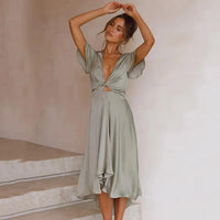 Dames Jurk met Strikdetails en V-Hals – Elegant & Vrouwelijk – Zymerelle